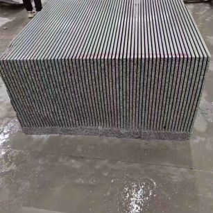 乌鲁木齐芝麻白毛板荒料切割