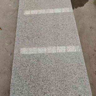 乌鲁木齐芝麻白光面毛板